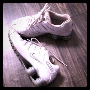 Gently used, white leather Nike Shocks. Size 7.5